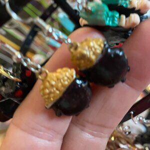 Handmade and crafted pot of gold dangling clay earrings